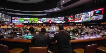 What defines a tether dice gaming experience?